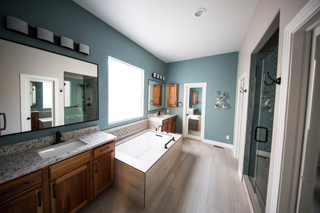 A renovated home bathroom with a bathtub